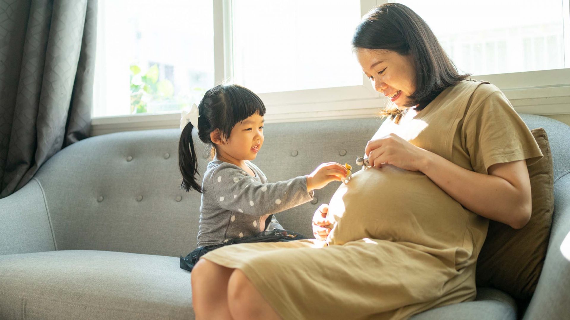 Pregnant Mother with Young Child