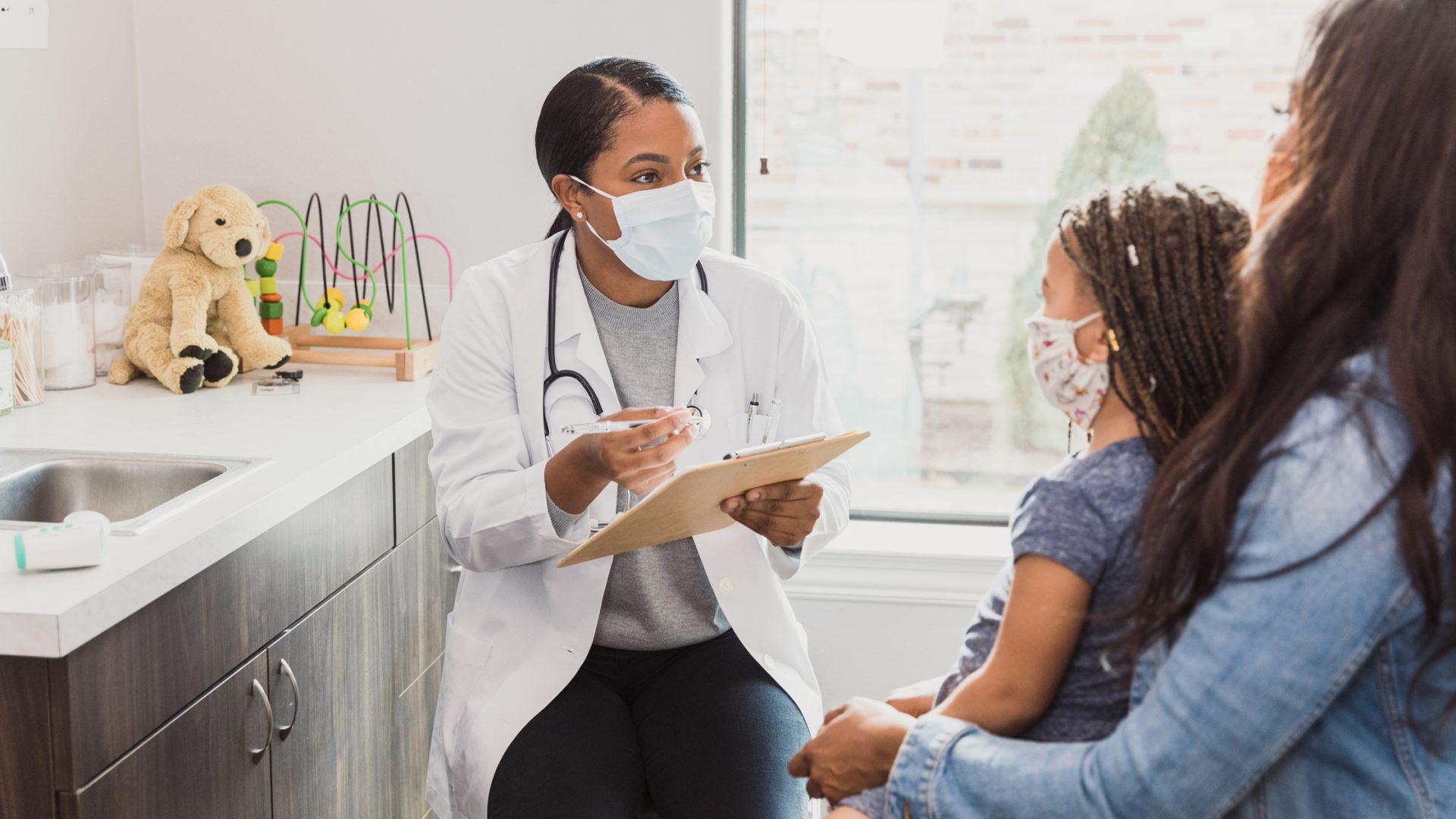 Doctor Consults With Patient